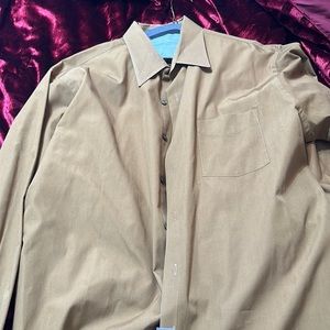 Freshly cleaned dress shirt by van Heusen 18x 34-35.  Bronze.